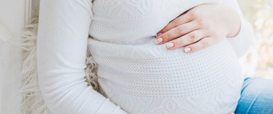 כאבי בטן בהריון: סוגים, סיבות ודרכי טיפול